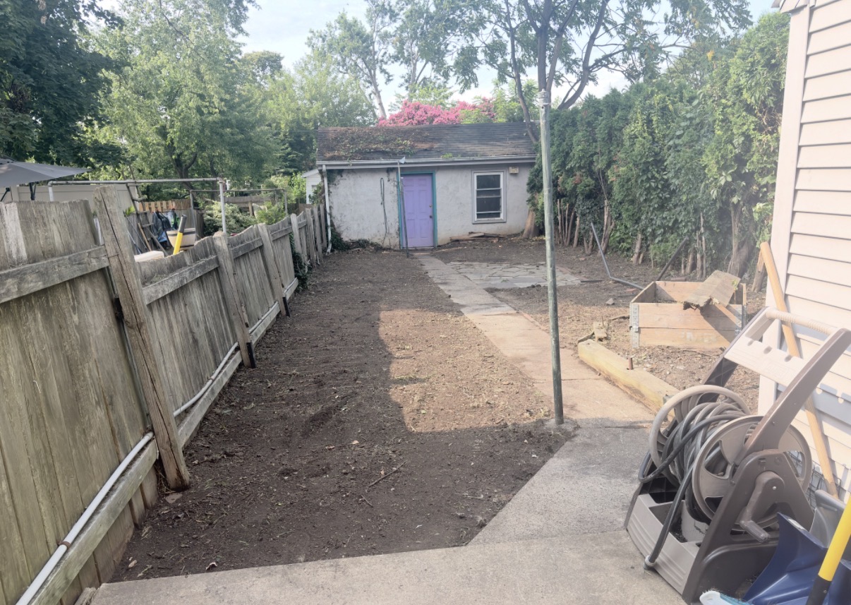 Backyard after heavy weed and overgrowth cleanup in Lancaster PA